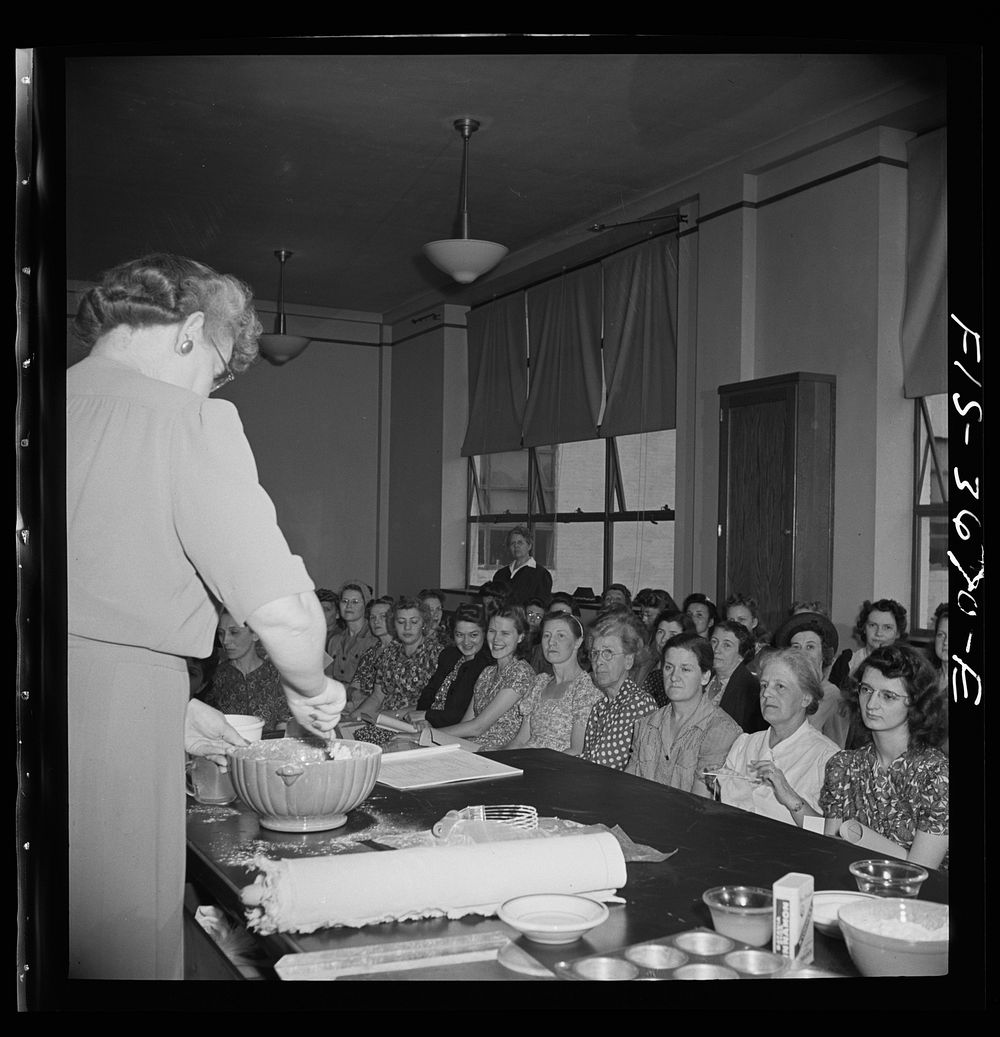Greenbelt, Maryland. The local utility company giving a cooking demonstration for Greenbelt women. Sourced from the Library…