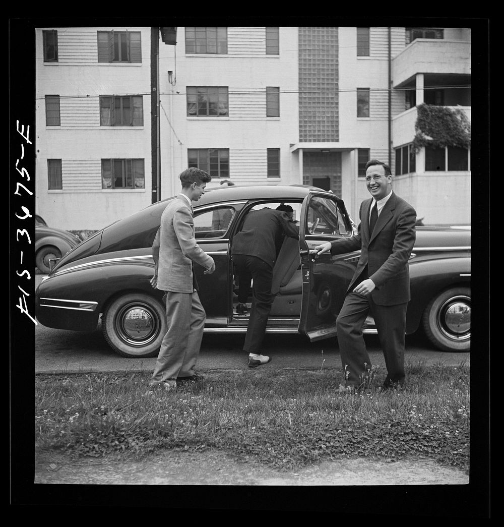 Greenbelt, Maryland. Greenbelt men commute to Washington, alternately sharing each other's cars. Sourced from the Library of…