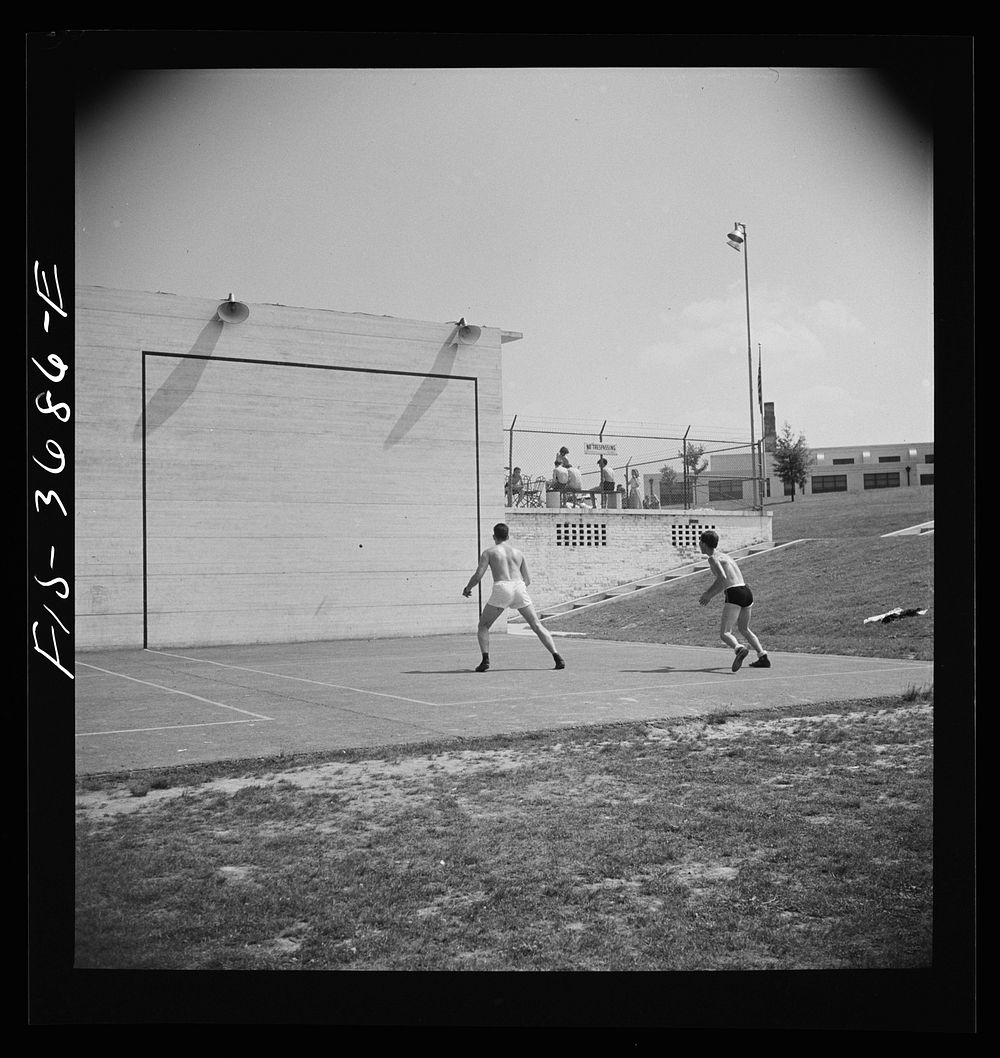 [Untitled photo, possibly related to: Greenbelt, Maryland. Handball courts behind the swimming pool]. Sourced from the…