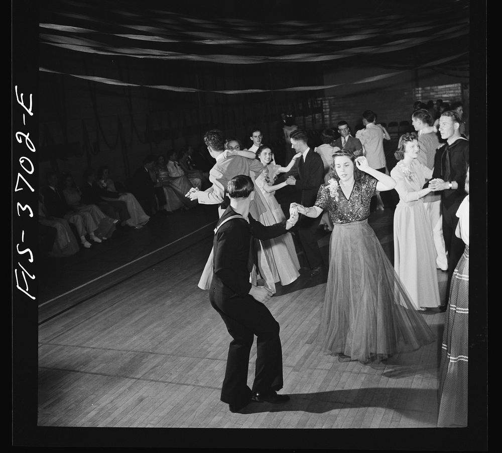 Greenbelt, Maryland. Sailor jitterbugging at the senior prom. Sourced from the Library of Congress.