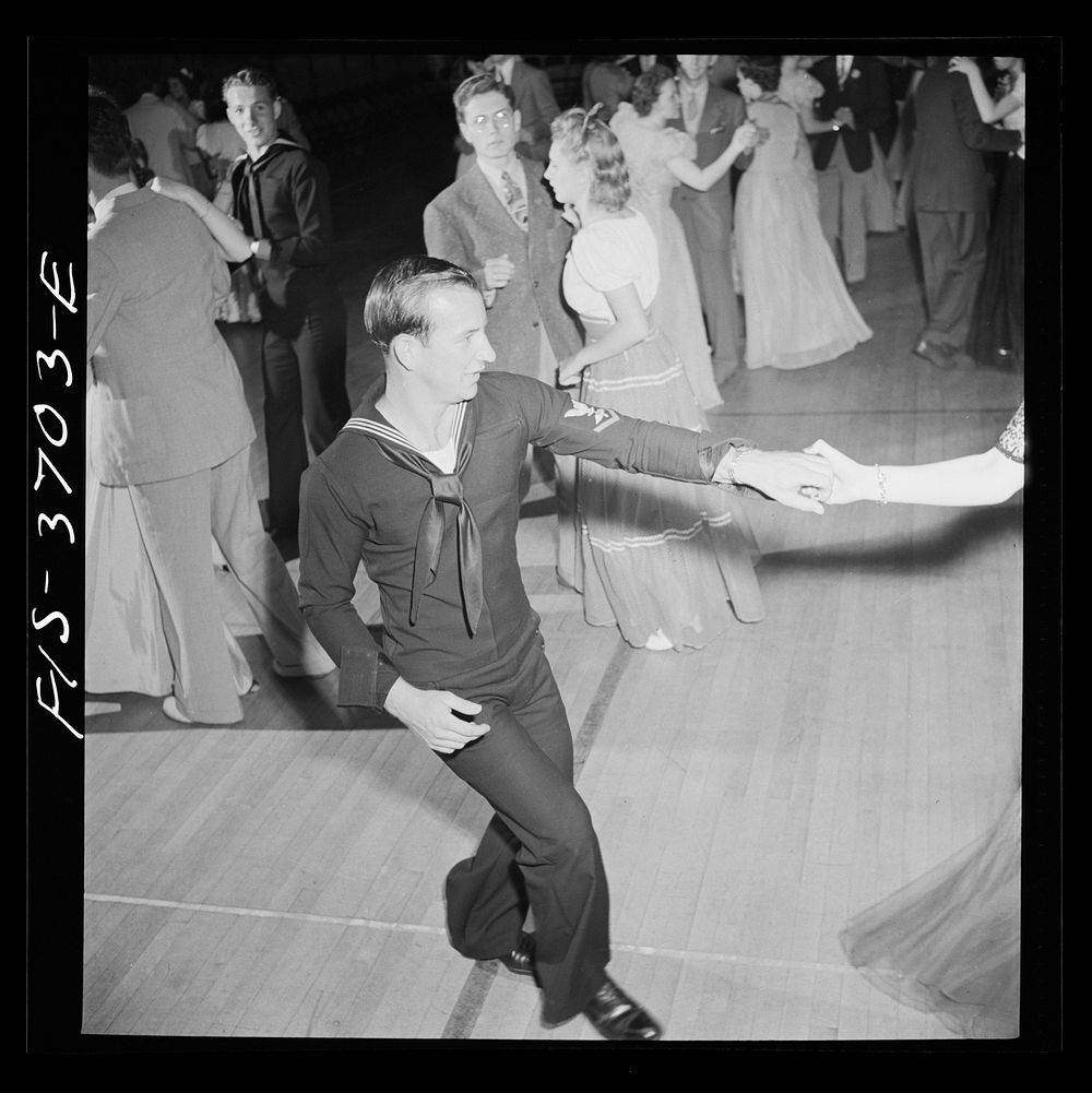 Greenbelt, Maryland. Sailor jitterbugging at the senior prom. Sourced from the Library of Congress.