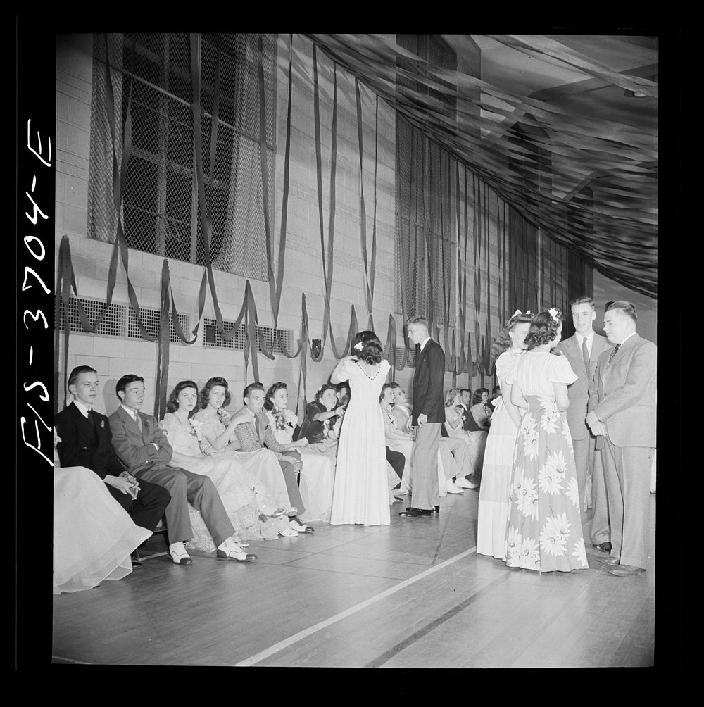 Greenbelt, Maryland. Between dances at the senior prom. Sourced from the Library of Congress.