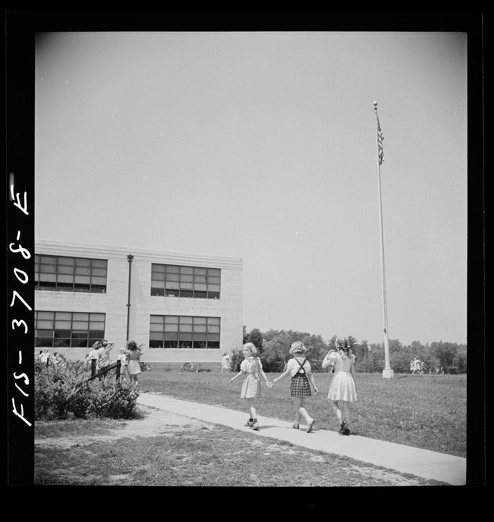 [Untitled photo, possibly related to: Greenbelt, Maryland. Federal housing project. Children going home from school].…