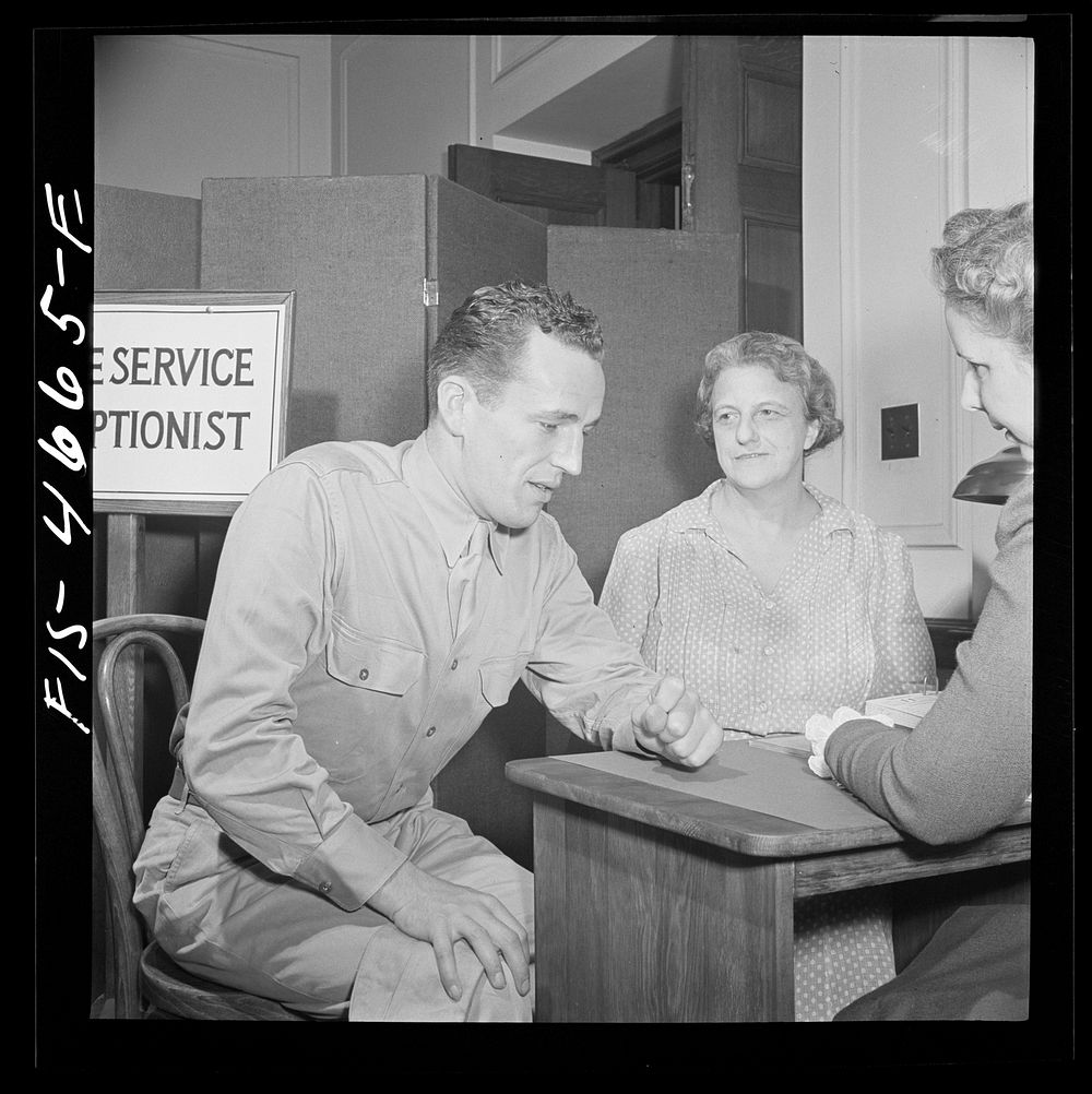 [Untitled photo, possibly related to: Washington, D.C. A soldier asking for help for his mother at the Red Cross home…