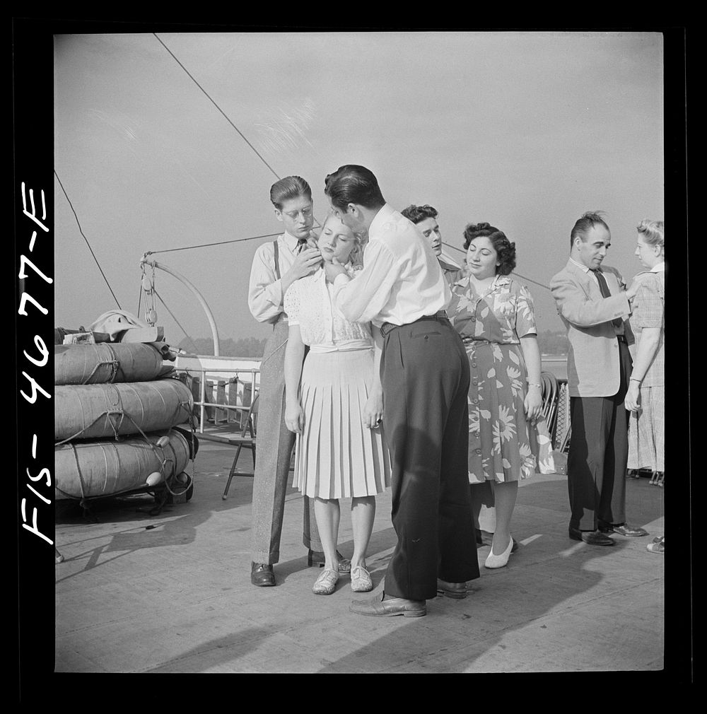Washington, D.C. Applying pressure to pressure point as part of a course in first aid, aboard a Potomac River boat. Sourced…