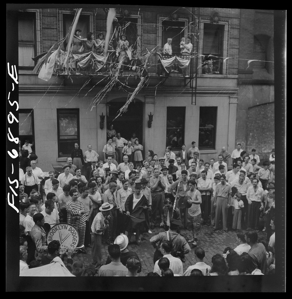 [Untitled photo, possibly related to: New York, New York. Dancing and music on Mott Street at a flag raising ceremony in…