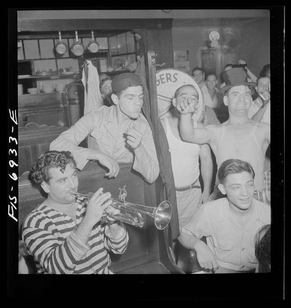 New York, New York. Brooklyn band of Italian-Americans, after playing at Mott Street flag raising ceremony in honor of…