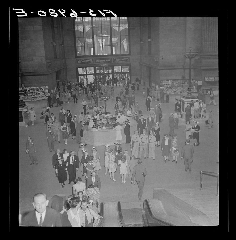 New York, New York. Information booth and escalators at the Pennsylvania railroad station. Sourced from the Library of…