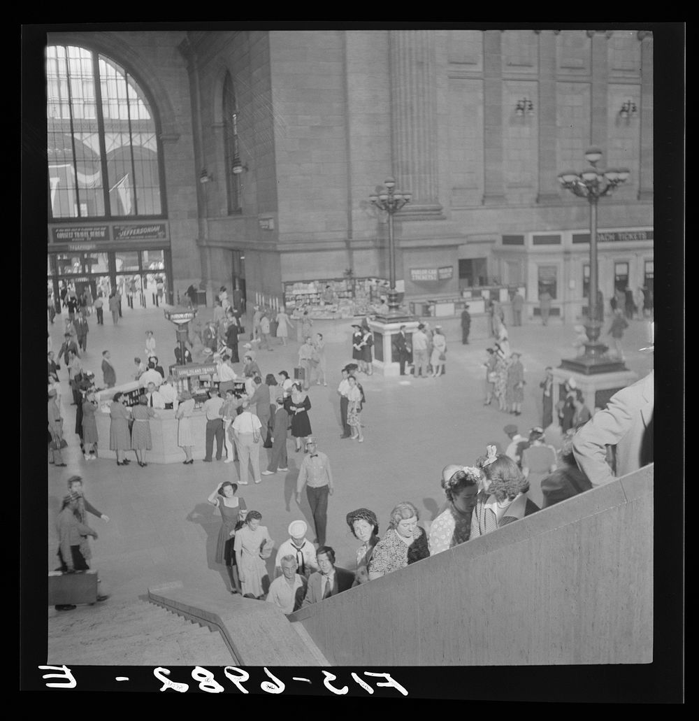 [Untitled photo, possibly related to: New York, New York. Information booth and escalators at the Pennsylvania railroad…