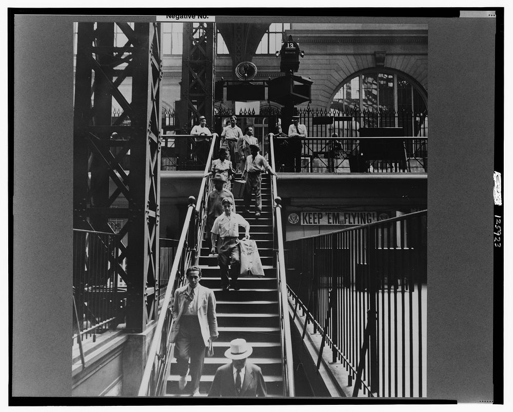 New York, New York. Stairway from concourse to trains at the Pennsylvania railroad station. Sourced from the Library of…