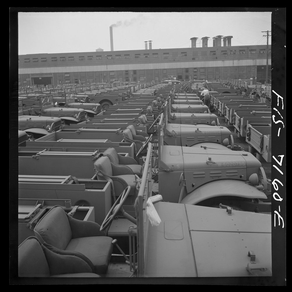 Detroit, Michigan (vicinity). Chryler Corporation Dodge truck plant. Side by side and end to end, hundreds of Dodge Army…