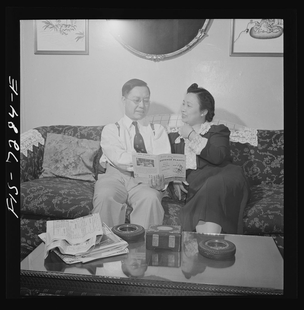 New York, New York. Mr. Fing, a Chinese-American merchant, and his wife in their Flatbush home. Notice the rubber tire…