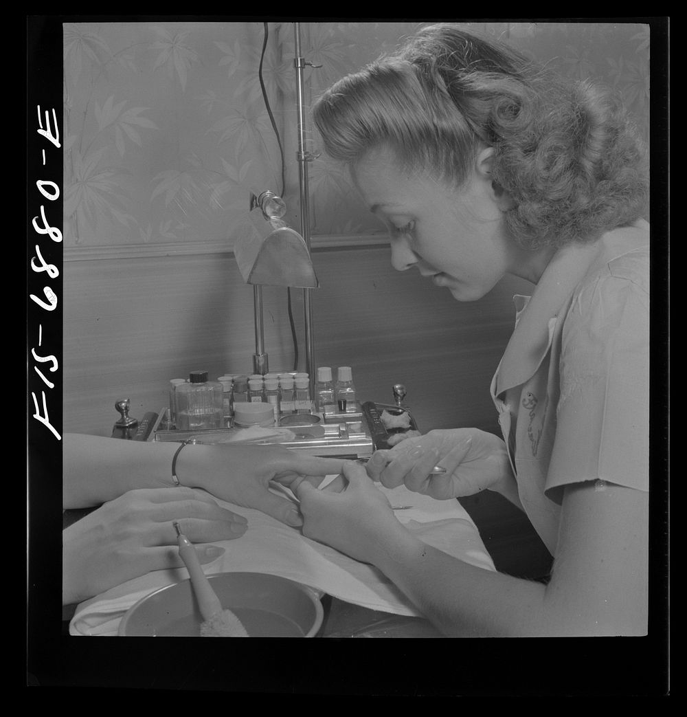 New York, New York. Manicurist at Francois de Paris, a hairdresser on Eighth Street. Sourced from the Library of Congress.
