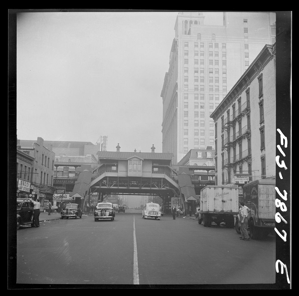 New York, New York. Looking west at the Third Avenue elevated railway on 14th Street at 7 a.m.. Sourced from the Library of…