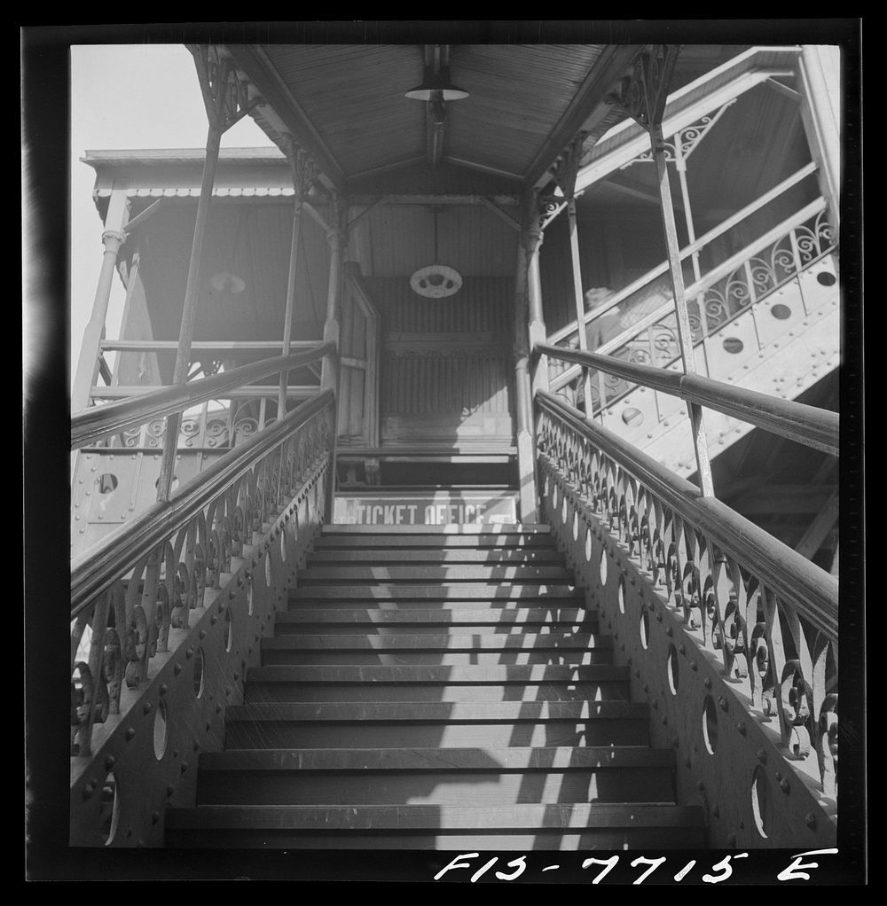[Untitled photo, possibly related to: New York, New York. Third Ave elevated railway steps at the 94th Street Station in the…