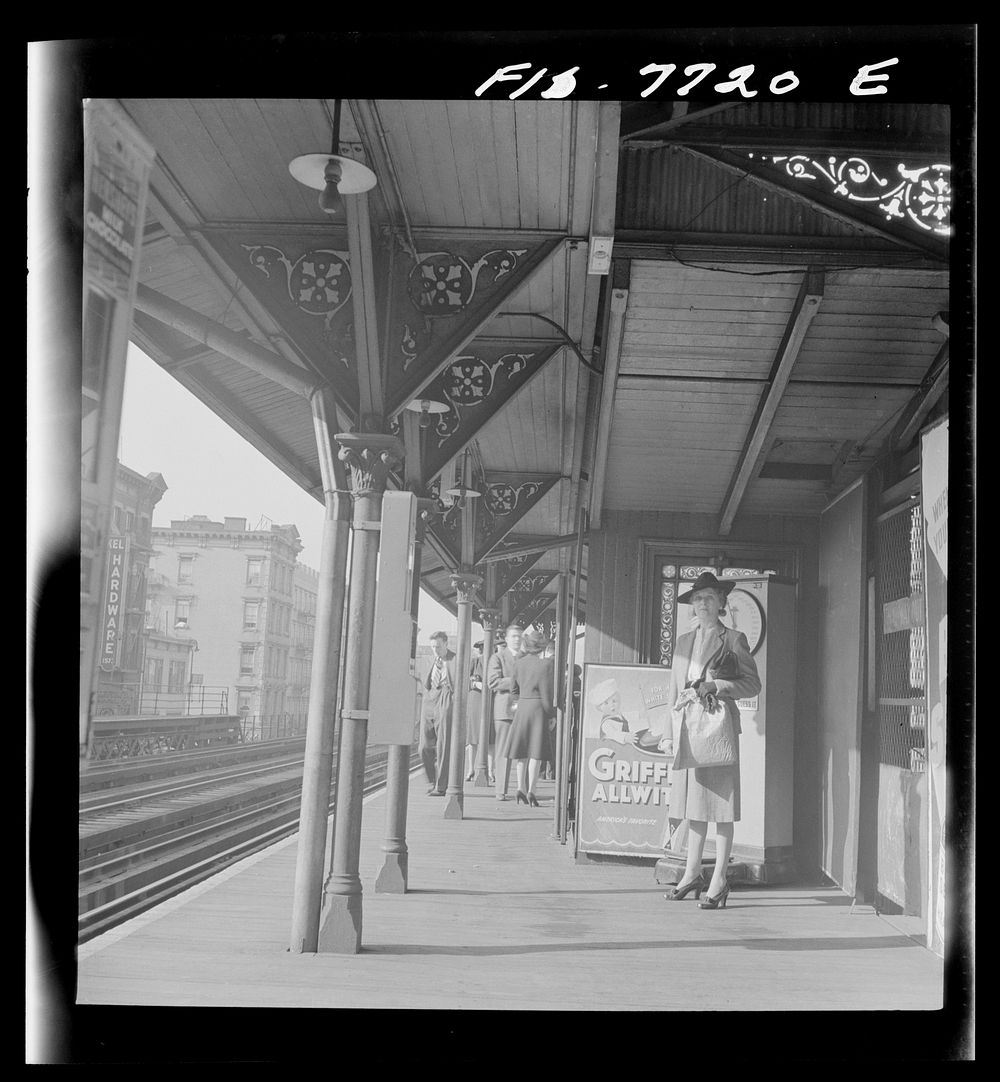 New York, New York. Third Avenue elevated railway station in the "Seventies" at 8:30 a.m.. Sourced from the Library of…