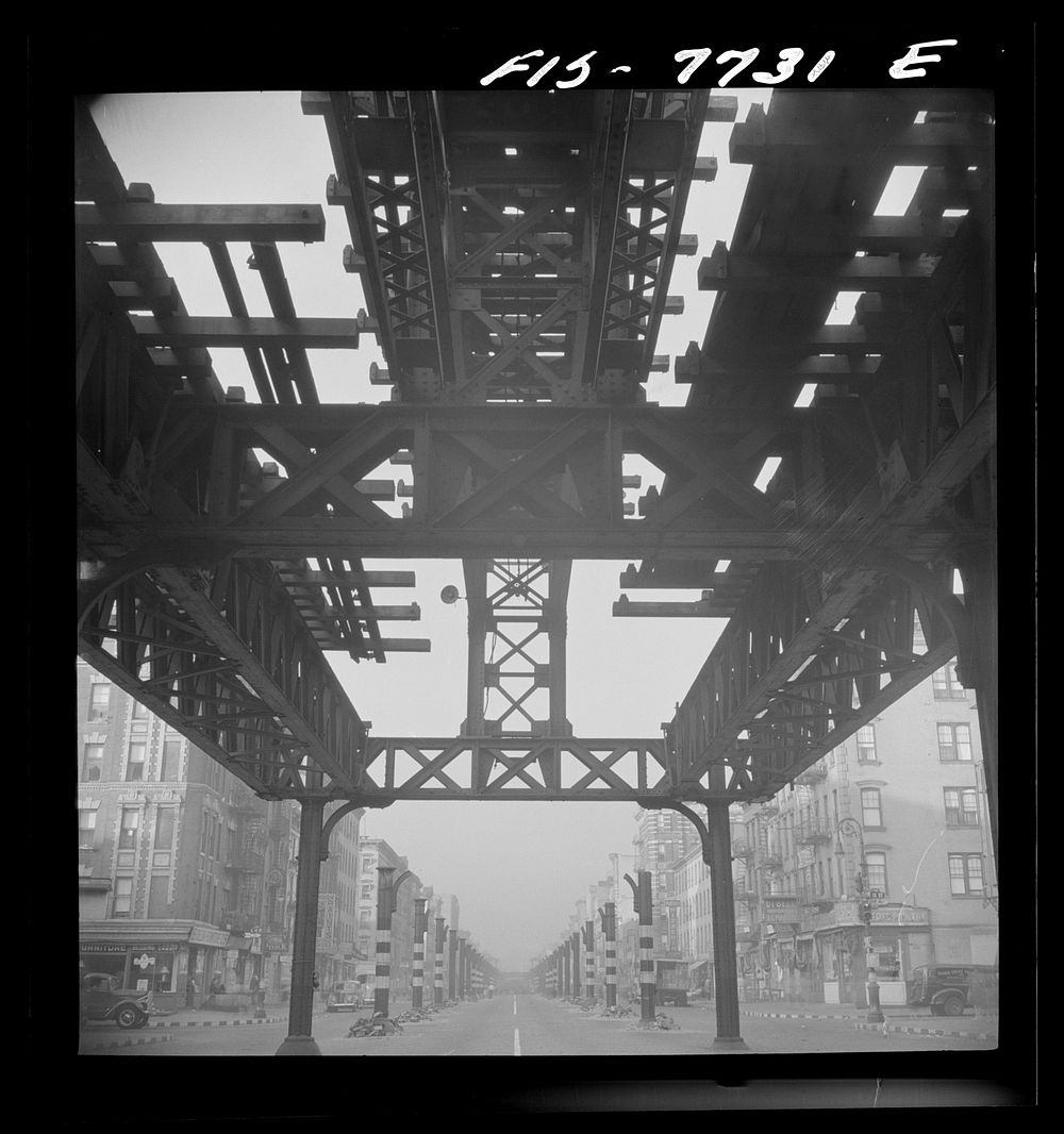 New York, New York. Looking south at 7 a.m. from 13th Street on Second Avenue, showing the elevated railway in midst of…