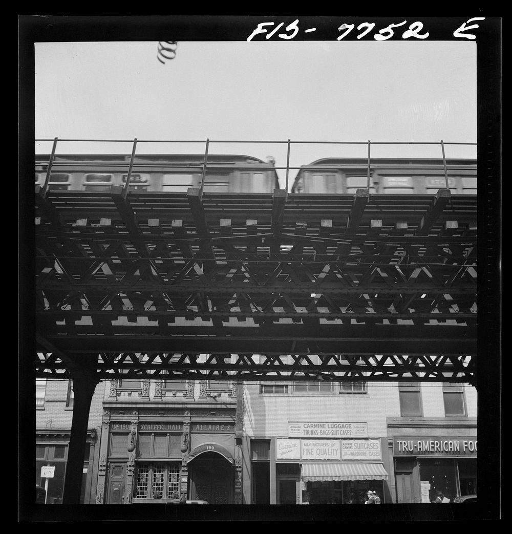 New York, New York. Third Avenue elevated railway at 17th Street near the German-American club. Sourced from the Library of…