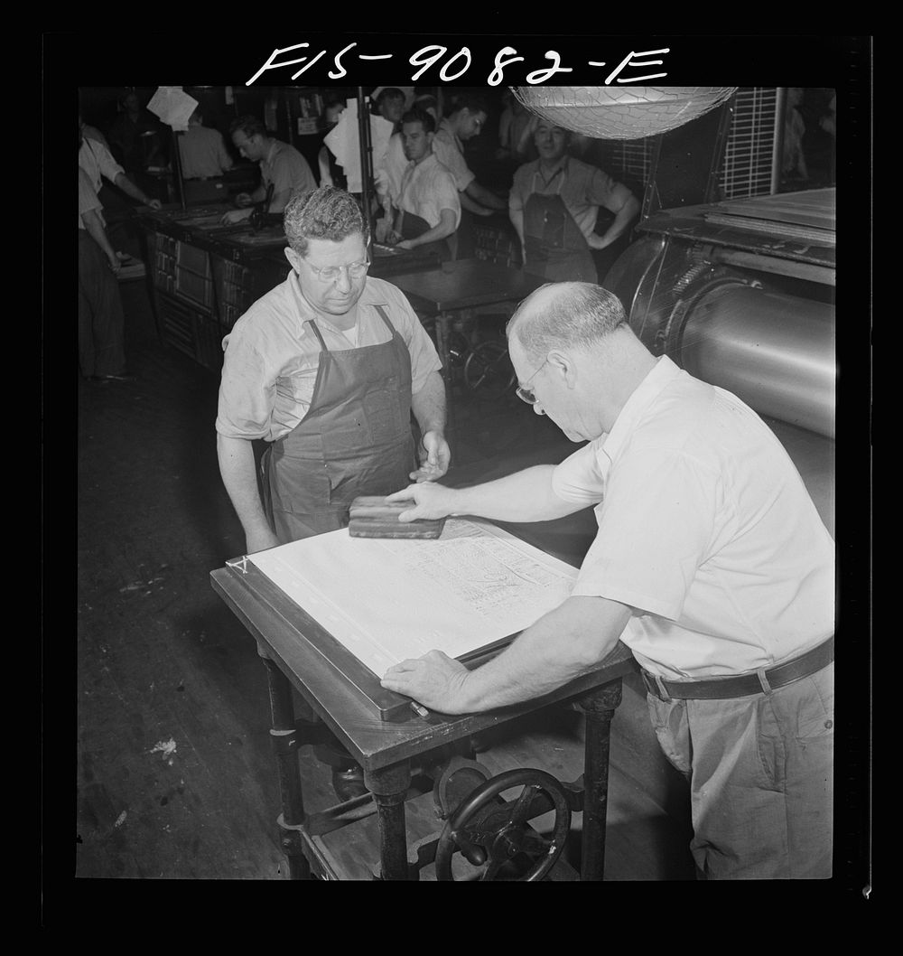 New York, New York. Composing room of the New York Times newspaper. Paper mat is made in "rock crusher" and inked for…