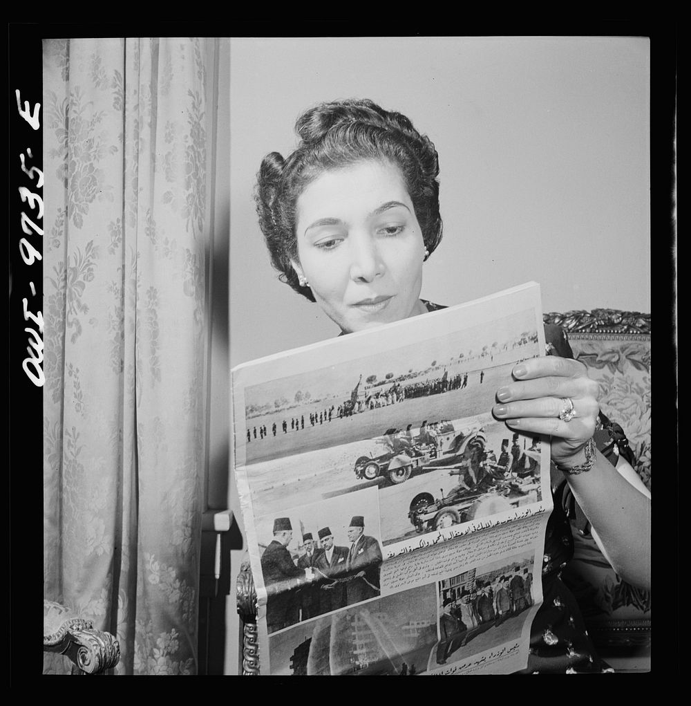 Washington, D.C. The Egyptian Legation on Massachusetts Avenue. Madame Hassan, wife of the minister, reading an Egyptian…