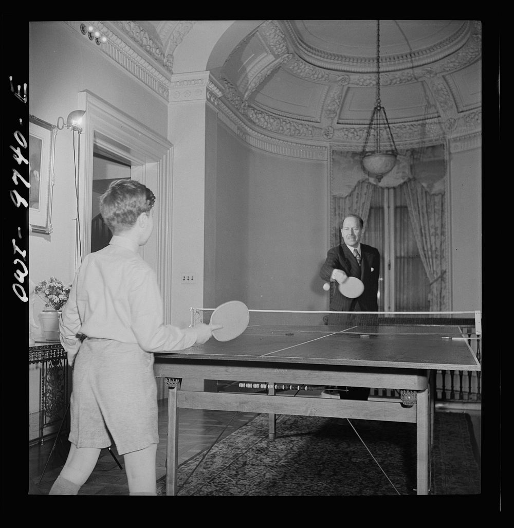 Washington, D.C. The Egyptian Legation on Massachusetts Avenue. Minister Hassan playing ping-pong with his son. Sourced from…