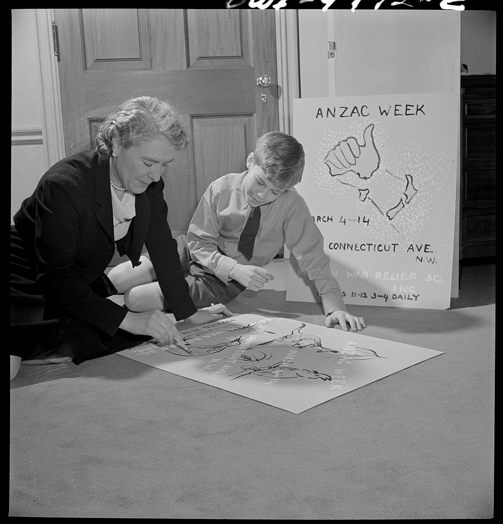 Washington, D.C. The Australian Legation. Mrs. Casey, wife of the minister, a good amateur artist, finishing a poster for…