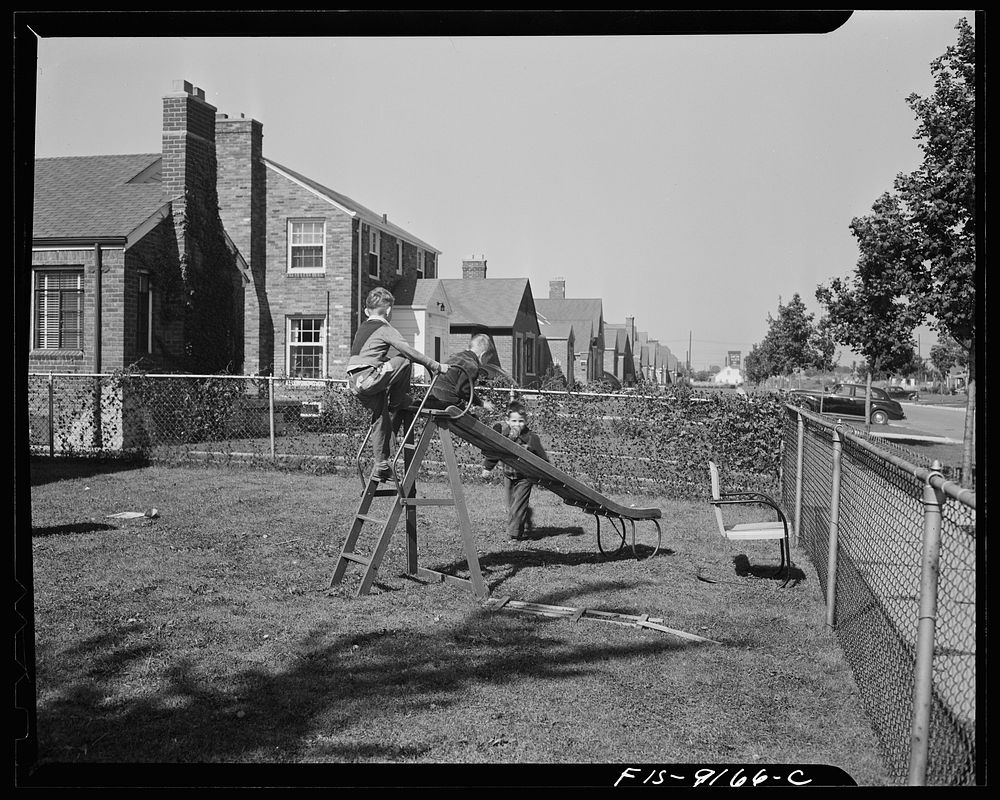 Detroit (vicinity), Michigan. Workers' children playing in the front yard. Sourced from the Library of Congress.