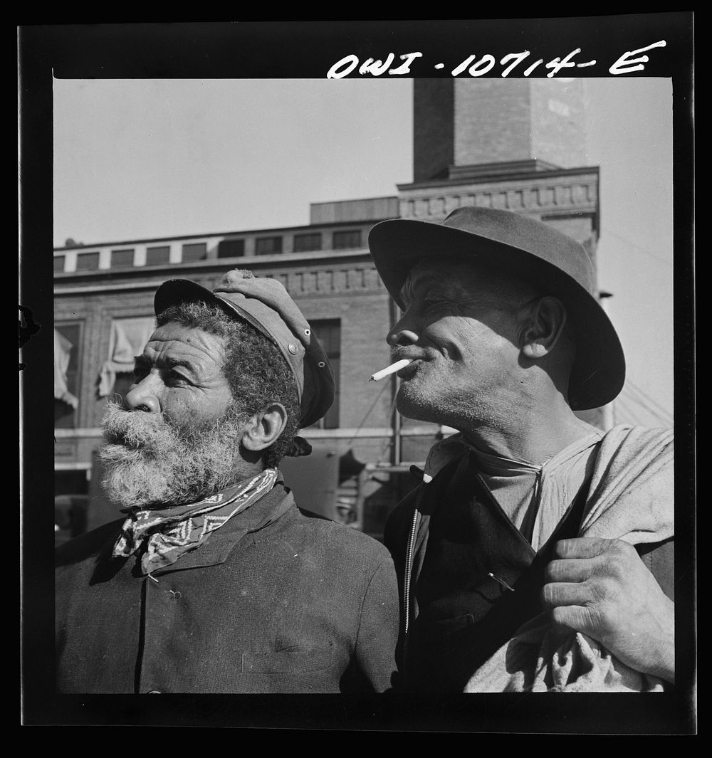Washington, D.C. "Whiskers" and Johnny Carrol, two familiar faces on the waterfront. Sourced from the Library of Congress.