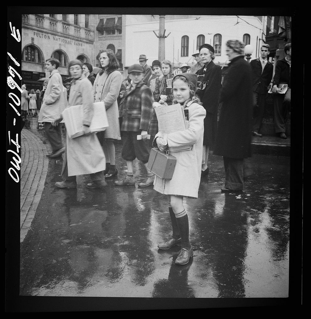 Lancaster, Pennsylvania. School child waiting for a bus in the rain. Sourced from the Library of Congress.