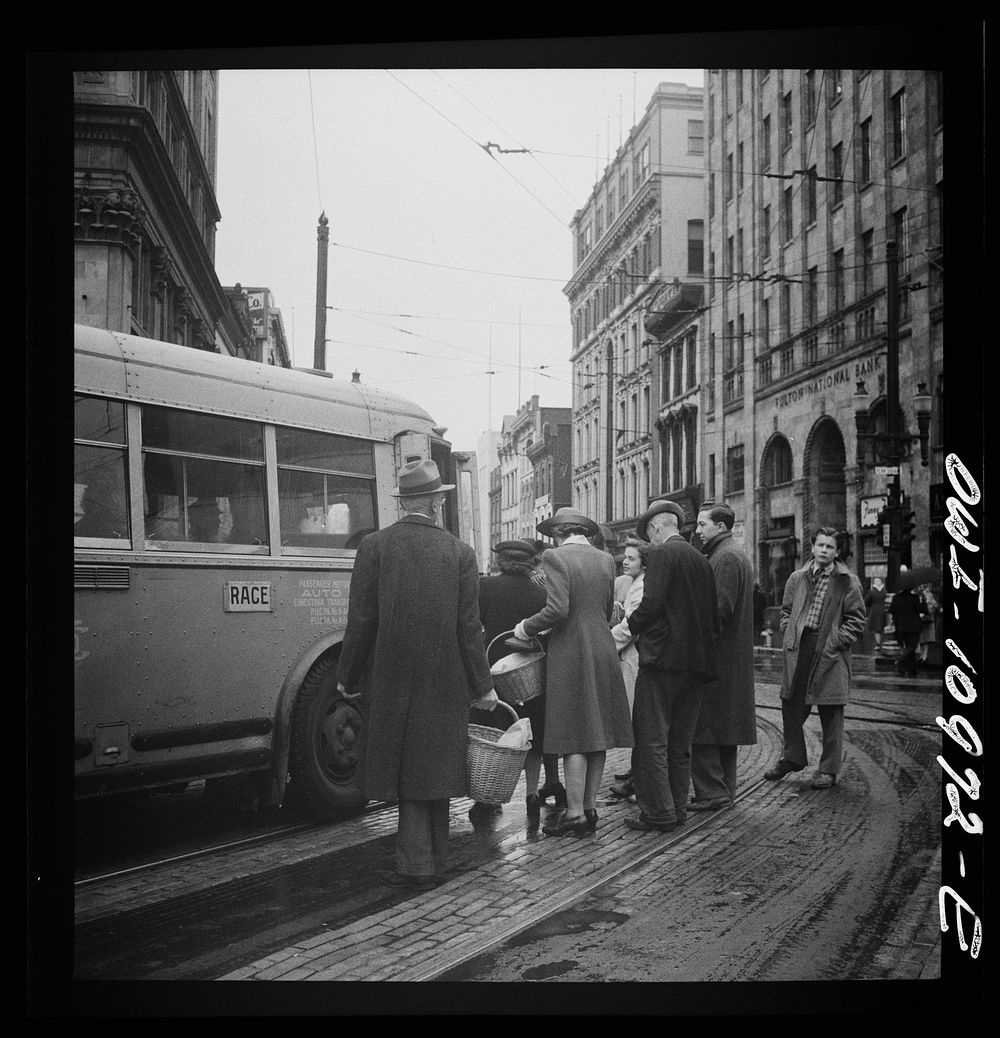 Lancaster, Pennsylvania. Boarding buses on a rainy market day. Sourced from the Library of Congress.