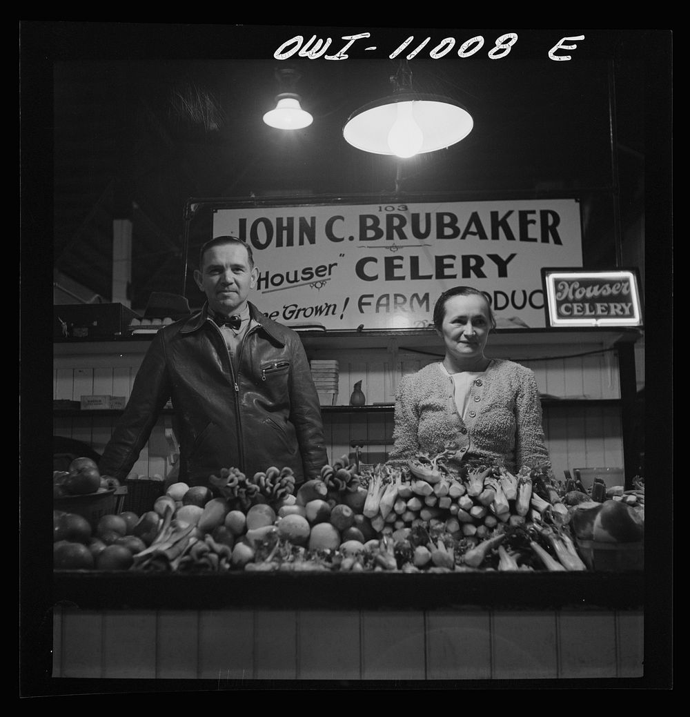 Farmer and his wife at her stall in Central Market. Lancaster, Pennsylvania. Sourced from the Library of Congress.