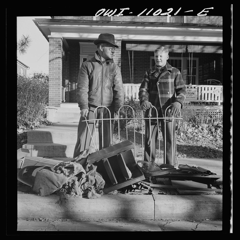 Lititz (vicinity), Pennsylvania. Scrap collection drive. Each household placed its contribution on the sidewalk. It was then…