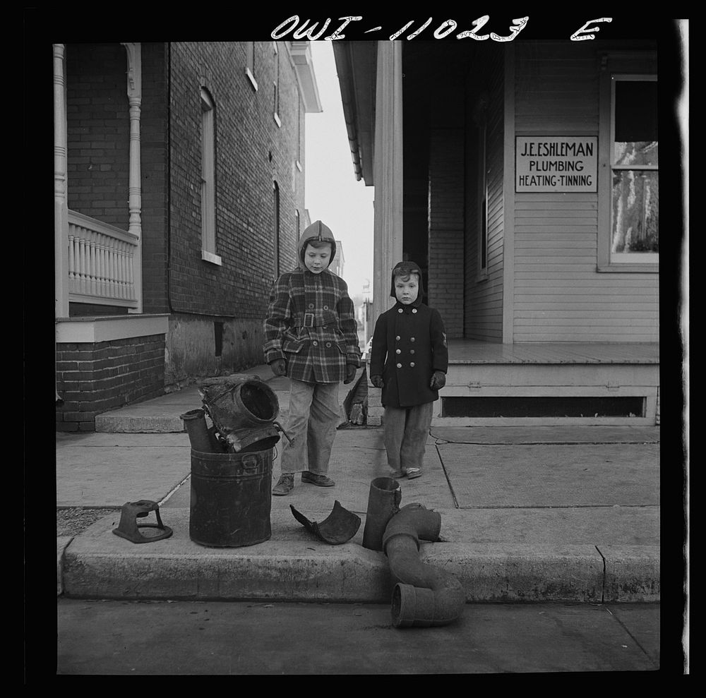Lititz, Pennsylvania. Scrap collection drive. Each household placed its contribution on the sidewalk. It was then picked up…