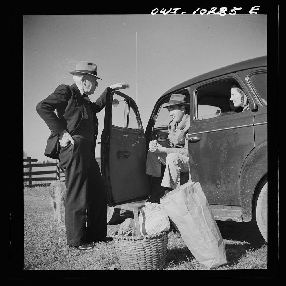 [Untitled photo, possibly related to: Montgomery County, Maryland. Farmers sharing a car on market day]. Sourced from the…