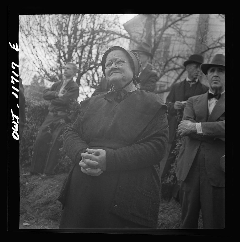 [Untitled photo, possibly related to: Lititz, Pennsylvania. Mennonite woman at a public sale]. Sourced from the Library of…