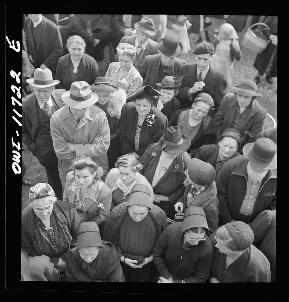 Lititz, Pennsylvania. Bidders at a public sale. Sourced from the Library of Congress.