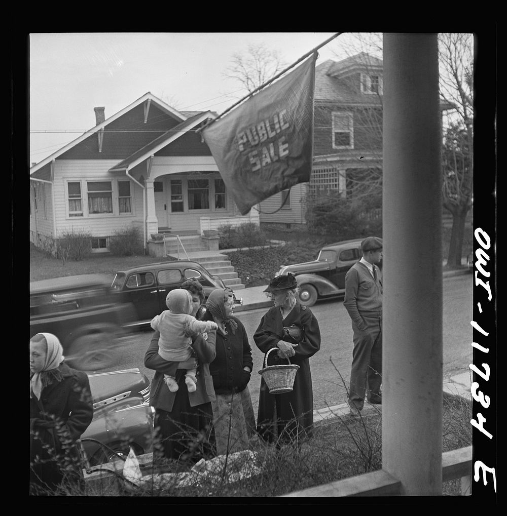 Lititz, Pennsylvania. Bidders at a public sale. Sourced from the Library of Congress.