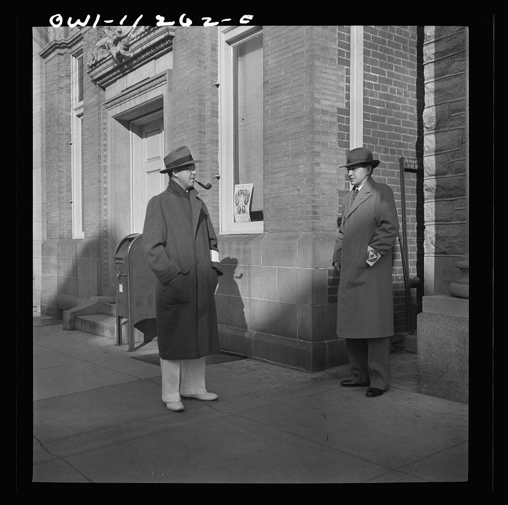 Lititz, Pennsylvania. Air raid wardens outside of the bank during an air raid drill. On left is Mr. Pennepacker, the barber.…