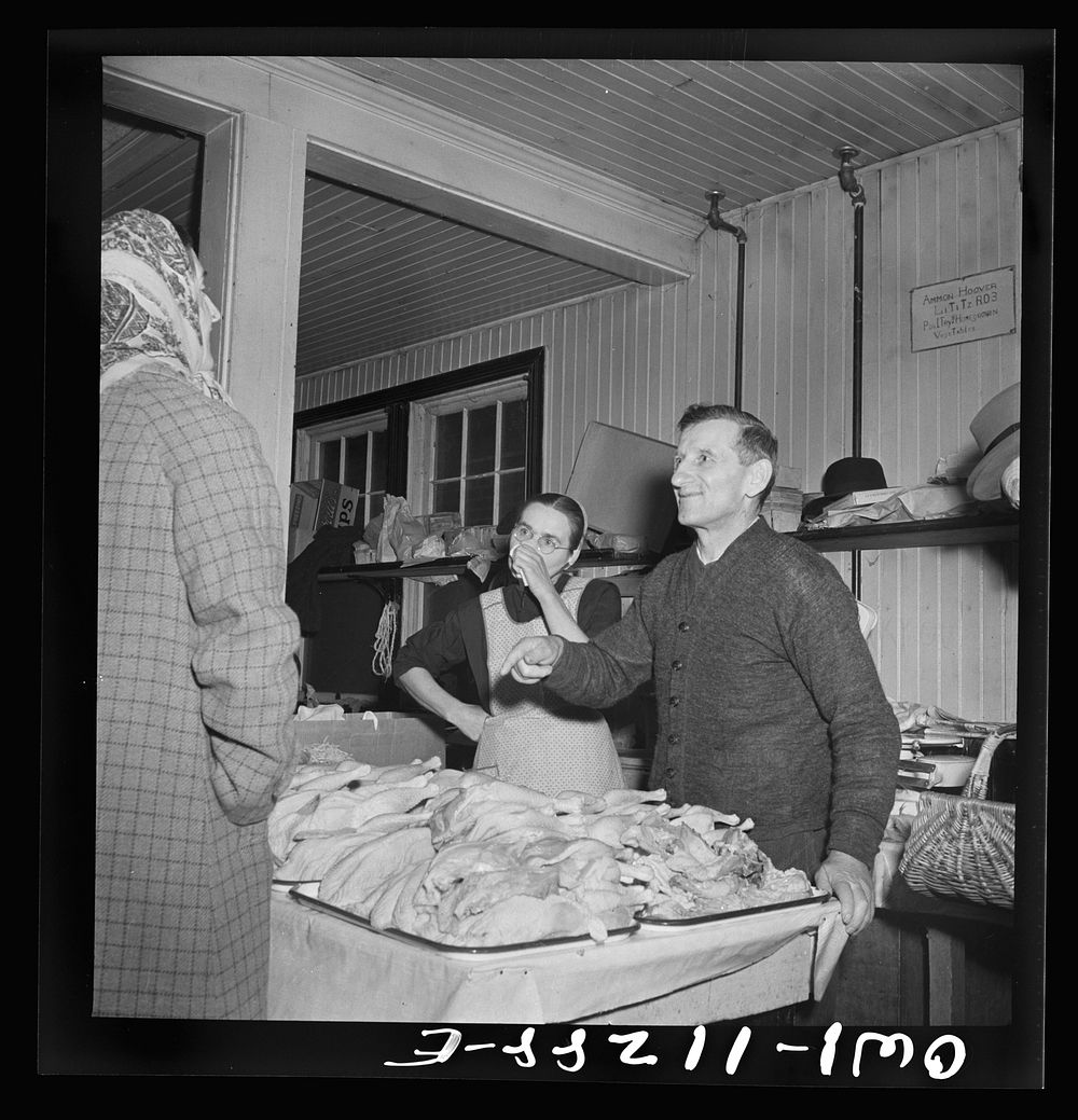 Lititz, Pennsylvania. Mennonite farmer and wife selling fowl at the farmers' market. Sourced from the Library of Congress.