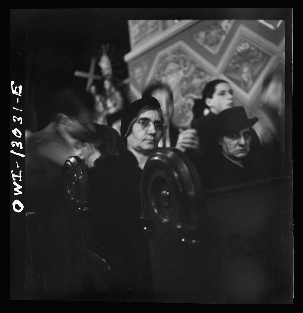 [Untitled photo, possibly related to: New York, New York. Midnight mass on Christmas Eve at Saint Dominick's church in an…