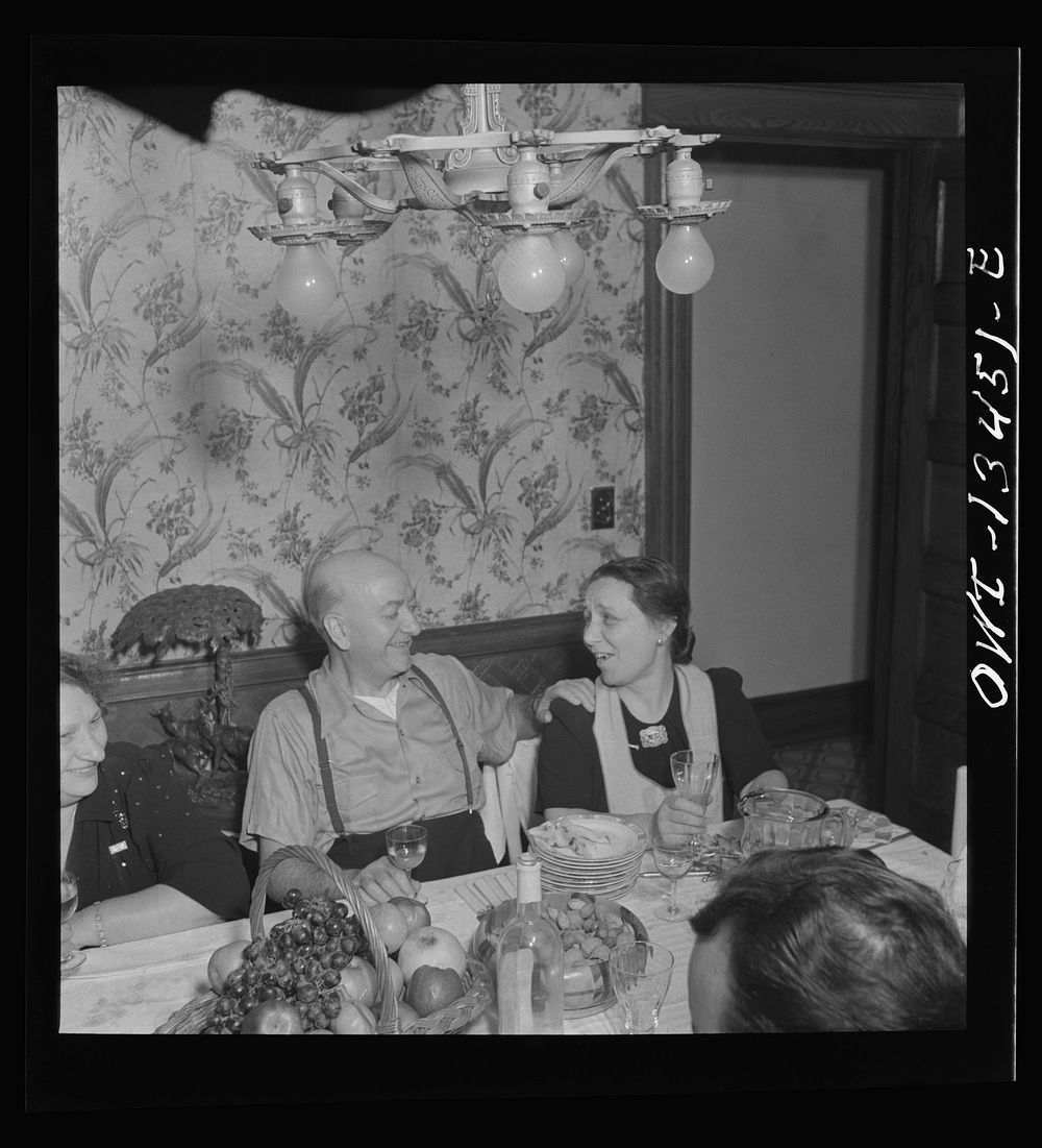 New York, New York. Mr. and Mrs. Martinetti at Sunday dinner at their home in the Bronx. Sourced from the Library of…
