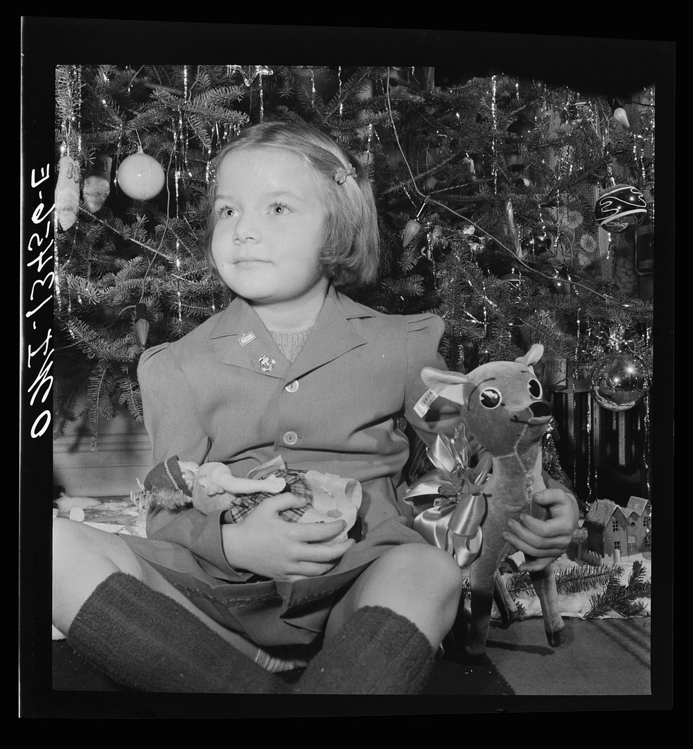 New York, New York. Martinetti grandchild and her Christmas tree. Sourced from the Library of Congress.