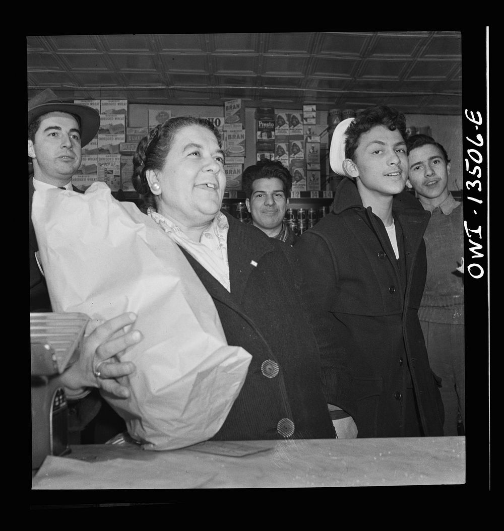 New York, New York. Italian-American customers in a grocery store on Mulberry Street. This woman said she wished her son in…