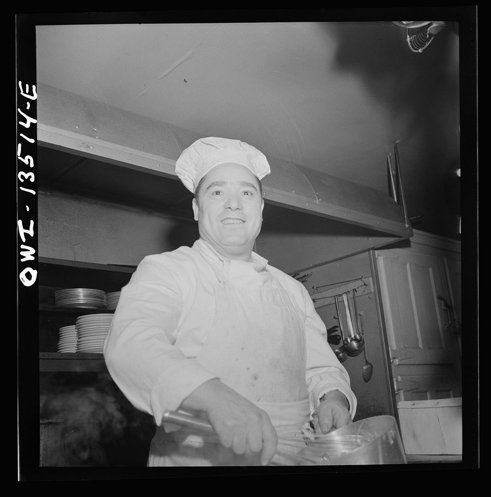 [Untitled photo, possibly related to: New York, New York. Chef at the Sixty-Eight restaurant on Fifth Avenue at Thirteenth…
