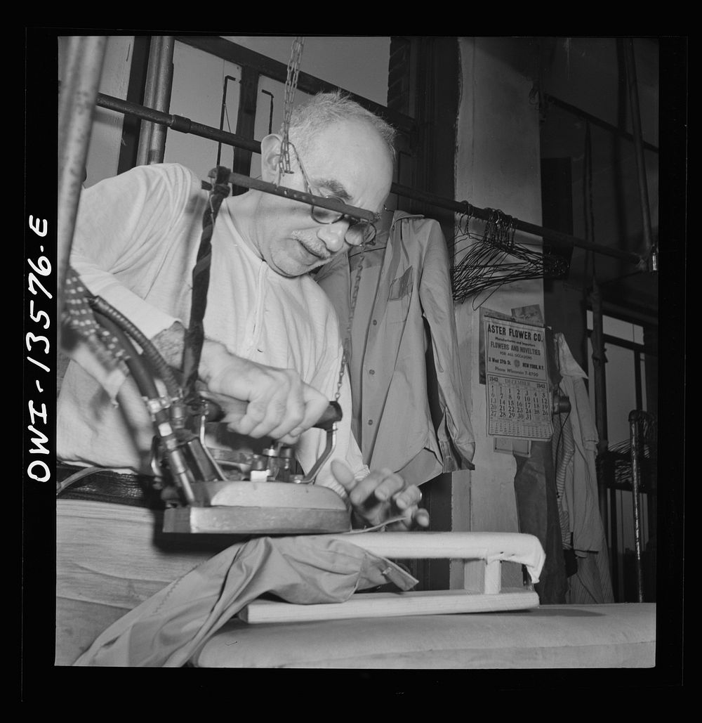 [Untitled photo, possibly related to: New York, New York. Pressers in the N.M. dress shop which is now making blouses for…