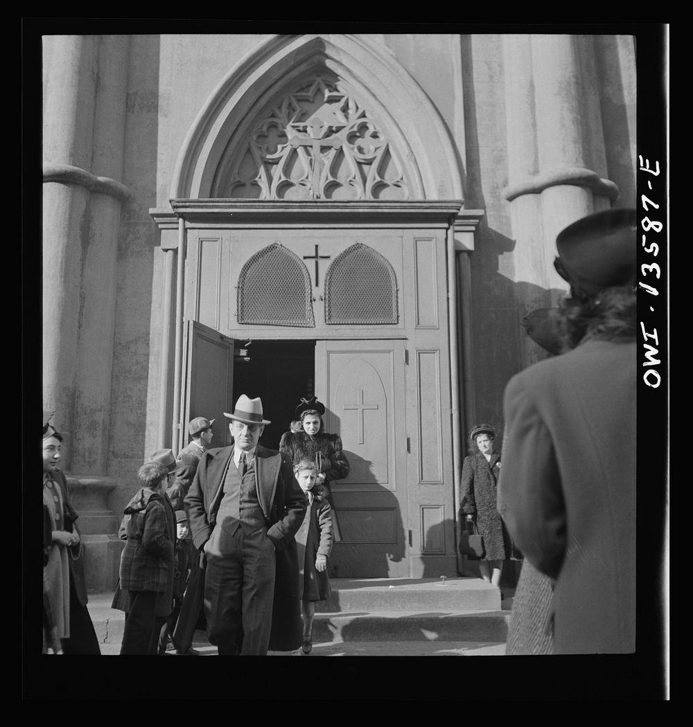 [Untitled photo, possibly related to: New York, New York. Italians coming out of Saint Patrick's Church on Mott Street on…