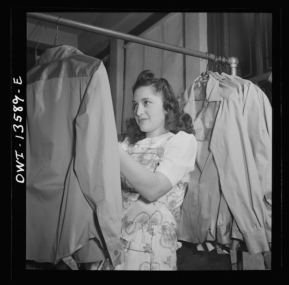 New York, New York. Jewish worker in the N.M. dress shop which is now making blouses for the Women's Army Auxiliary Corps…