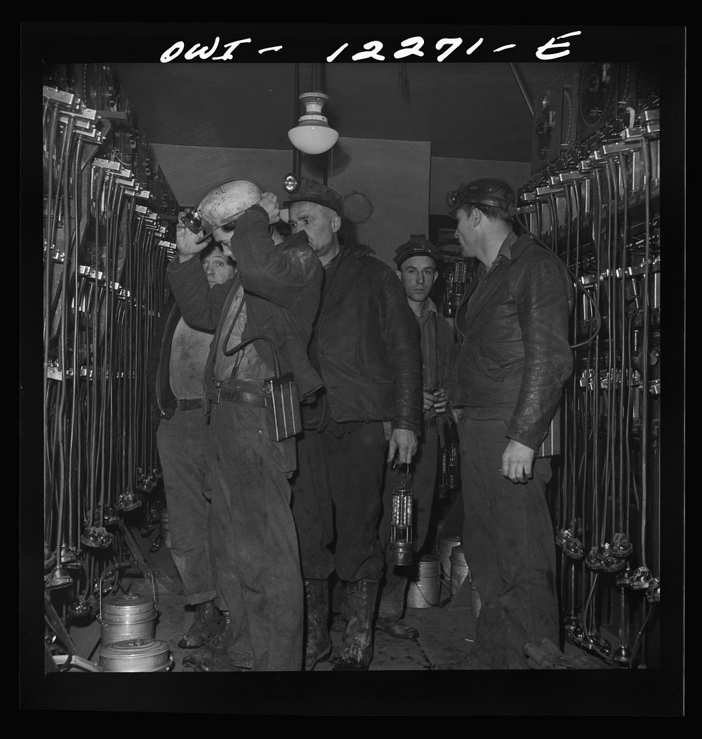 Pittsburgh, Pennsylvania (vicinity). Montour no. 4 mine of the Pittsburgh Coal Company. Miners getting their head and safety…