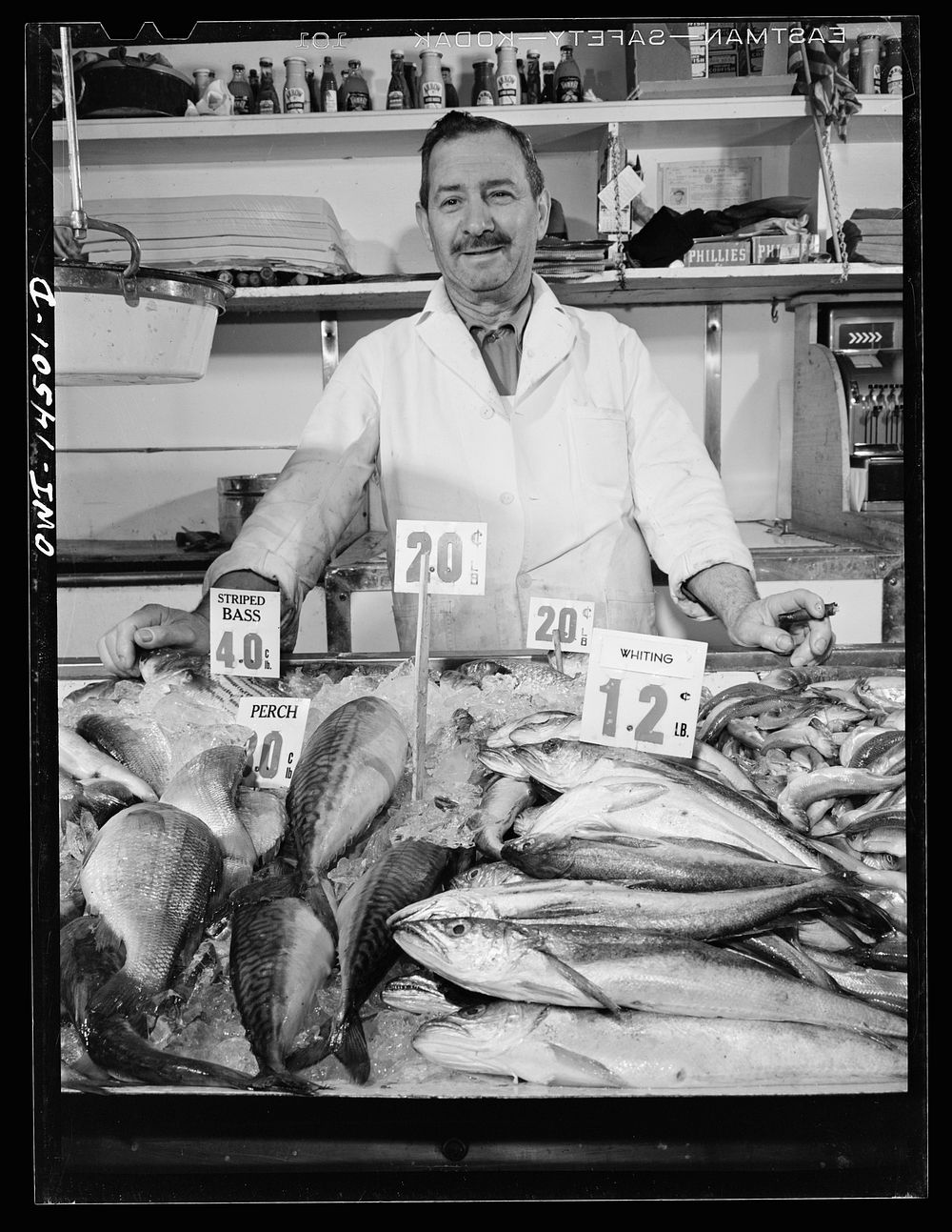 New York, New York. Fish merchant in the First Avenue market at Tenth Street. Sourced from the Library of Congress.