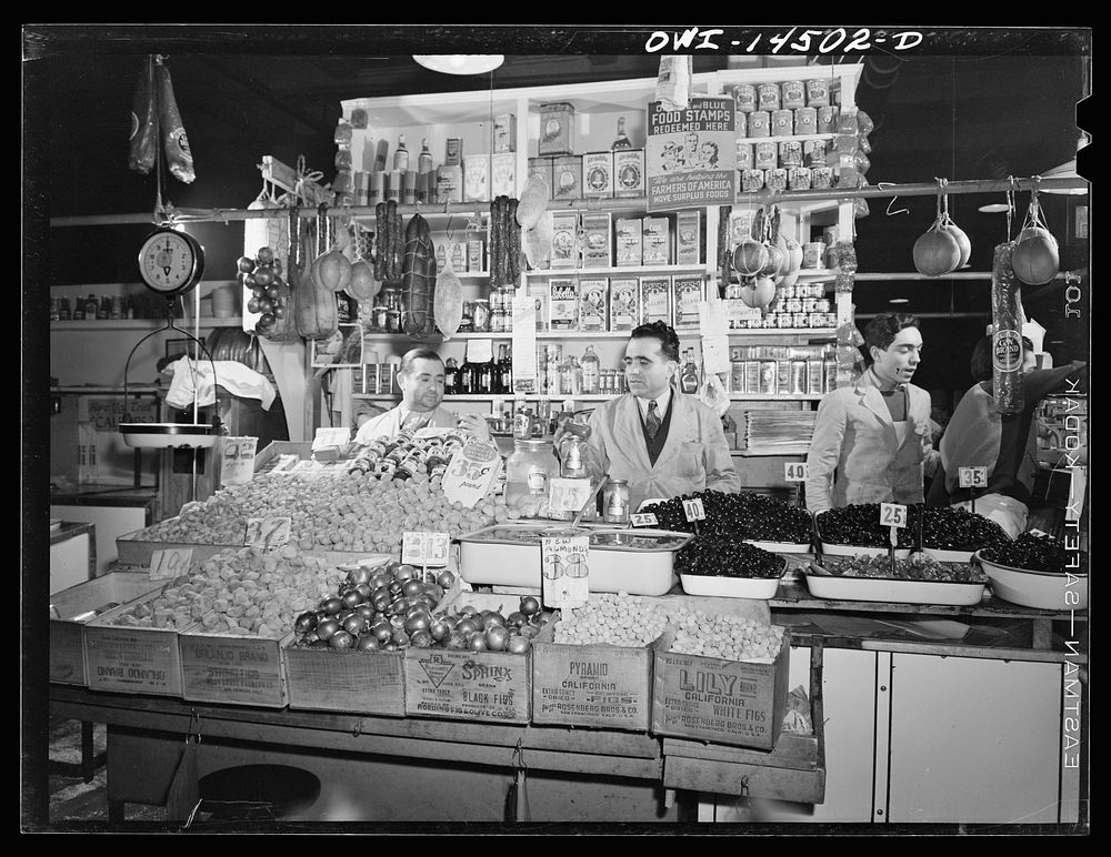 New York, New York. Italian grocer in the First Avenue market at Tenth Street. Sourced from the Library of Congress.